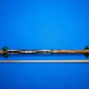 Full length Black and Brass custom pool cue by Kaine Cues on a clean background.