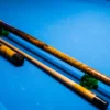 Dragon Scale custom pool cue by Kaine Cues featuring camphor wood and dragon scale inlays