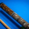 Close-up of the stabilized dyed maple burl handle and sterling silver rings on the Silver Three cue